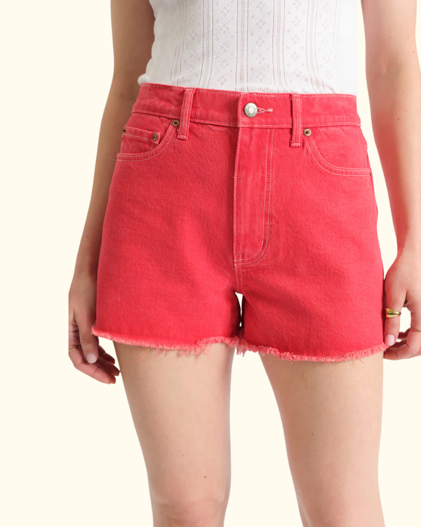 Close-up of Troublemaker High Rise Shorts in Chili Pepper waist and button detail
