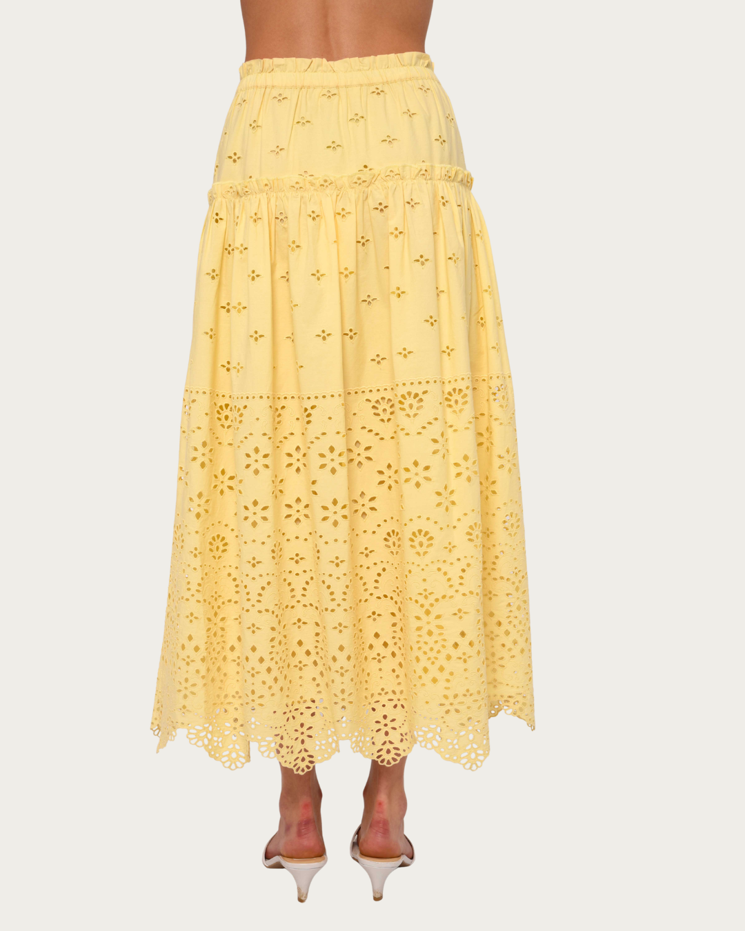 Back view of Angelique Skirt with elastic waist and eyelet hem