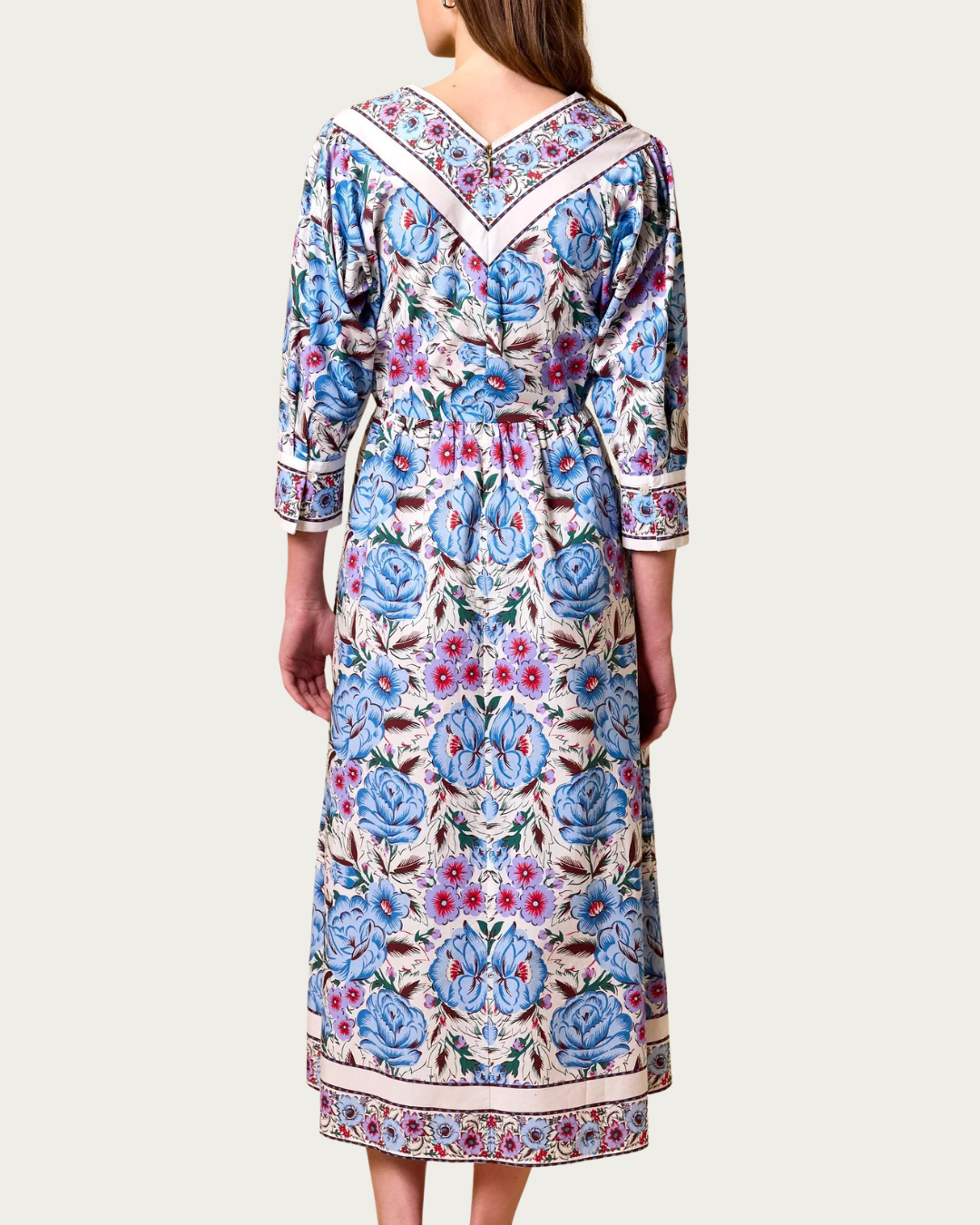 Back view of Blanche Midi Dress Fluora with placed floral print and zipper closure