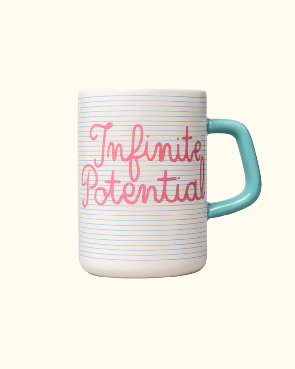 Ceramic mug with Infinite Potential text and teal handle front view