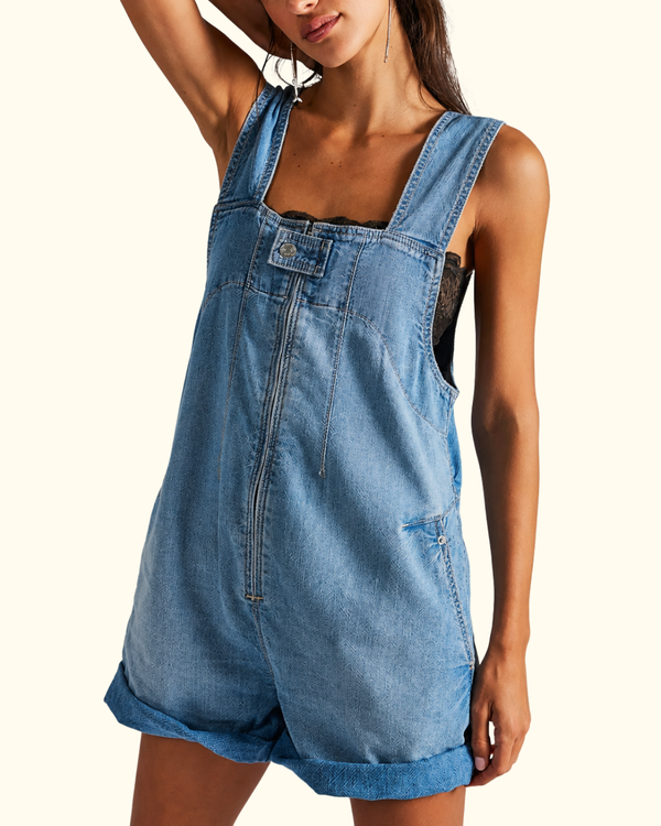 Model wearing Jude Shortall in Light Indigo with relaxed denim fit and wide shoulder straps