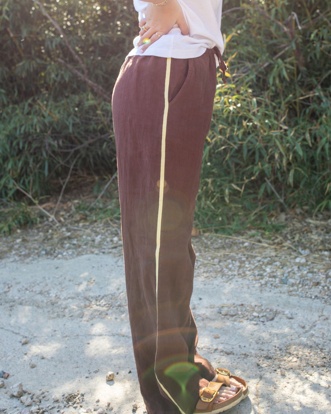 Espresso brown linen track pant with contrast side stripe front view