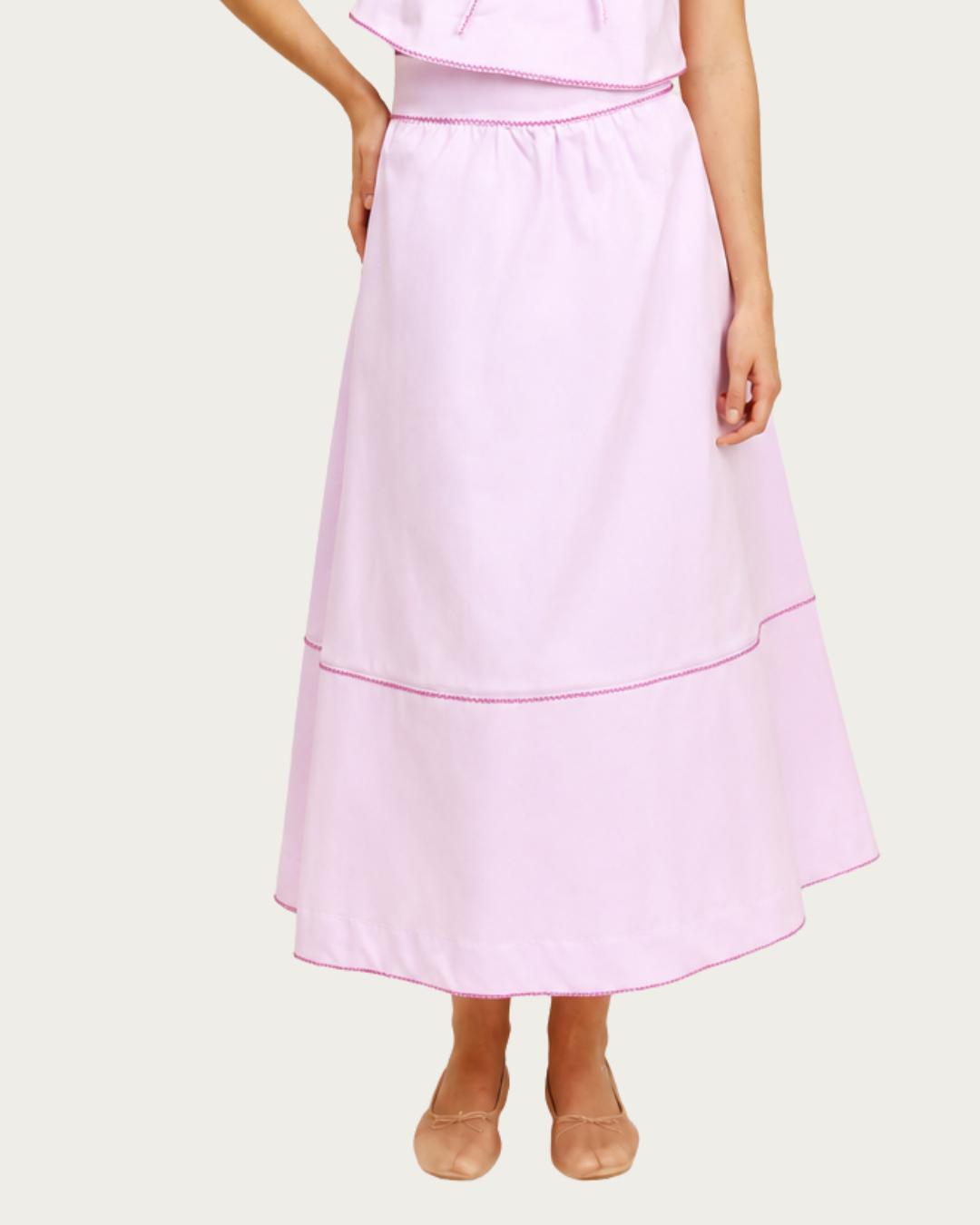 Lotus Skirt Pink midi skirt with bright pink contrast trim